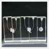 0a93fa321f044375b64b24355294a0d7 Five transparent resin endodontic training blocks showing different simulated root canal pathways