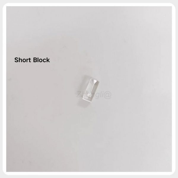 Short Endodontic Training Block Short transparent resin endodontic training block with a visible simulated root canal