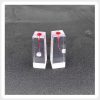 Stained Pulp Chamber Training Blocks in Two Orientations Two transparent resin endodontic training blocks with red-stained pulp chambers displayed in different orientations