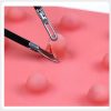 Laparoscopic Tissue Traction and Dissection Practice Silicone laparoscopic dissection training pad demonstrating tissue traction and separation